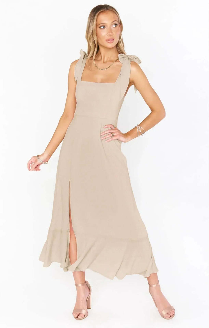 Lightweight & breathable women's sleeveless summer dress. Elegant midi length, comfortable for casual wear.