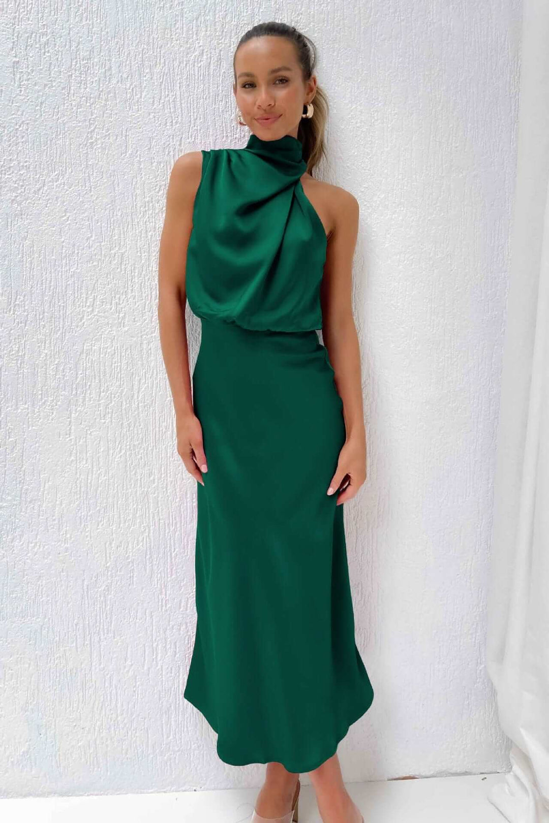 Sophisticated women's satin cocktail dress with a flattering elegant design.