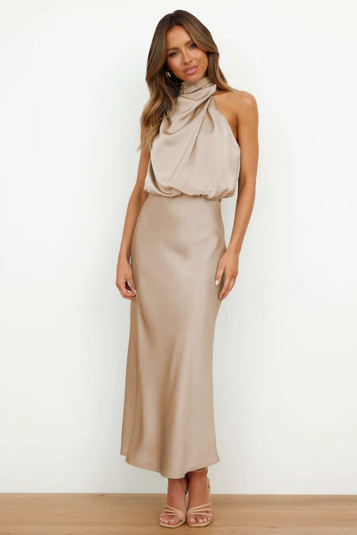 Stylish women's slim fit evening gown made from luxurious satin fabric.