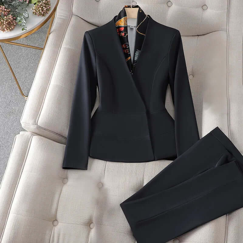 Stylish women's slim fit suit set, versatile for business, formal events & modern professional style.