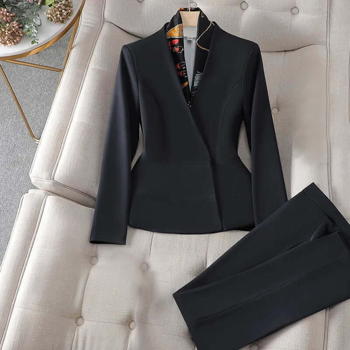 Stylish women's slim fit suit set, versatile for business, formal events & modern professional style.