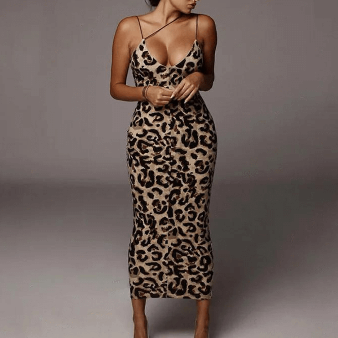 Stylish women's midi dress featuring a chic snake print pattern. Elegant and fashionable for various occasions.