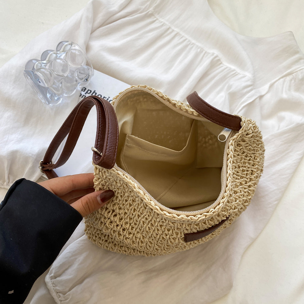 Versatile women's shoulder bag offering relaxed elegance & spacious comfort for daily use. A stylish accessory.