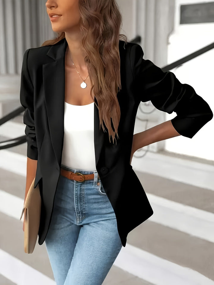 Chic women's solid tailored blazer, ideal for workwear, office fashion, and professional settings.