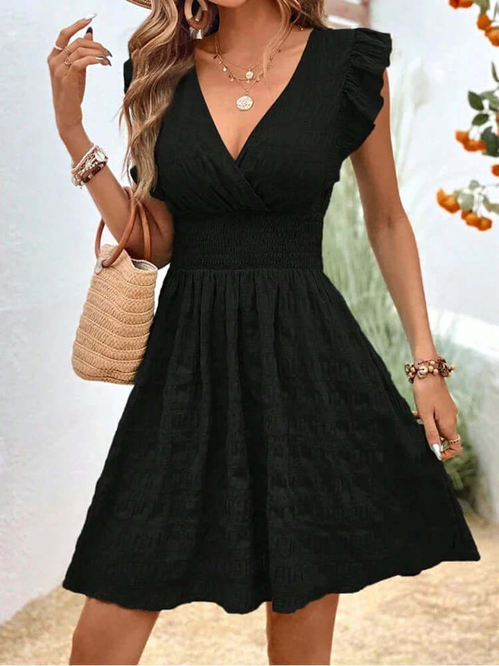 Fashionable women's elegant mini dress, polyester blend, perfect for warm weather style.