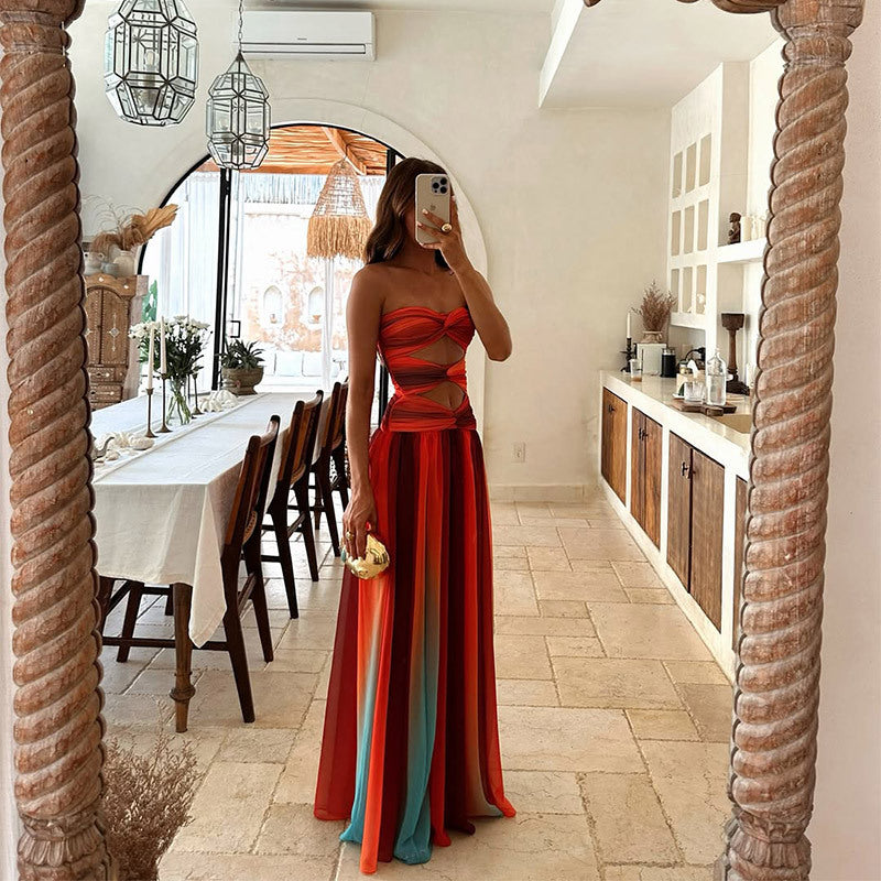 Flowy long strapless maxi dress for women, excellent for elegant evening events or chic summer parties.