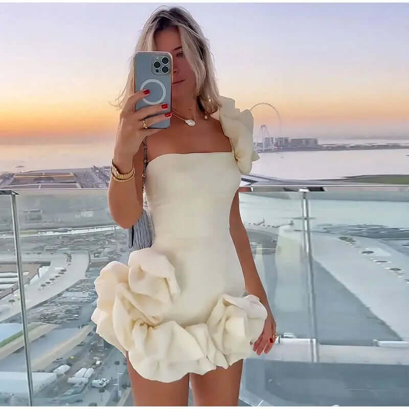 Elegant women's strapless ruffle mini dress, perfect for parties, cocktails & evening occasions.