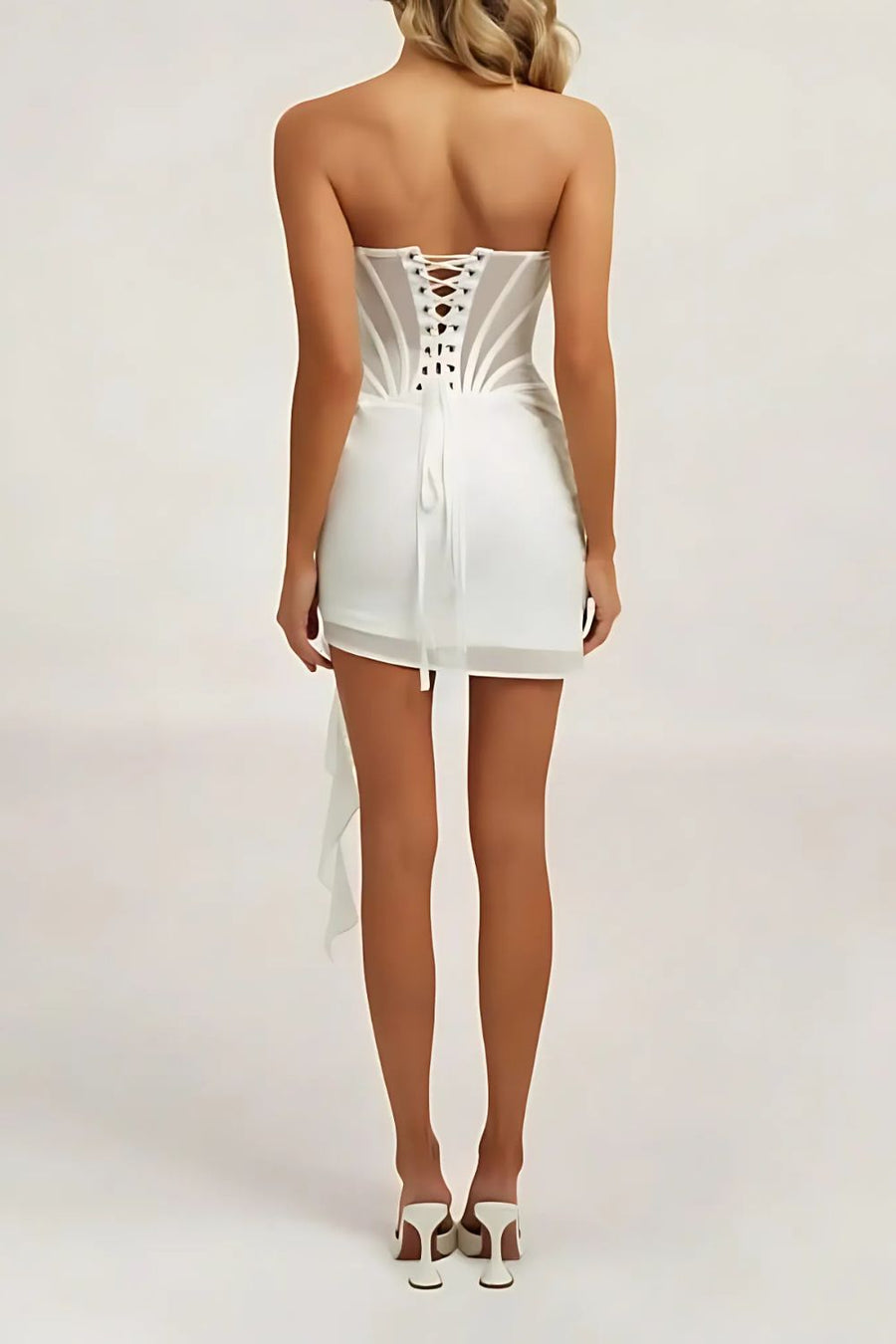 Women's glamorous strapless sheer mini dress with boned corset, perfect for club, party or special occasions.