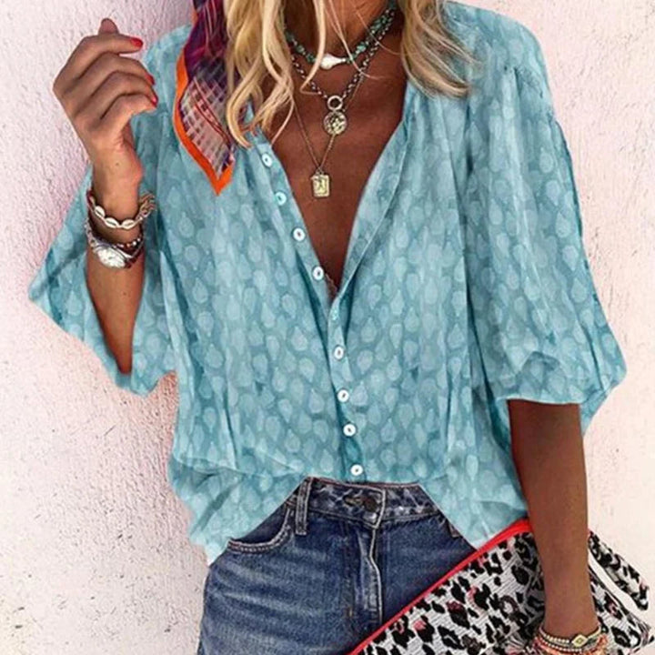 Elegant women's summer blouse, airy and comfortable. Perfect short sleeve top for versatile spring and everyday style.