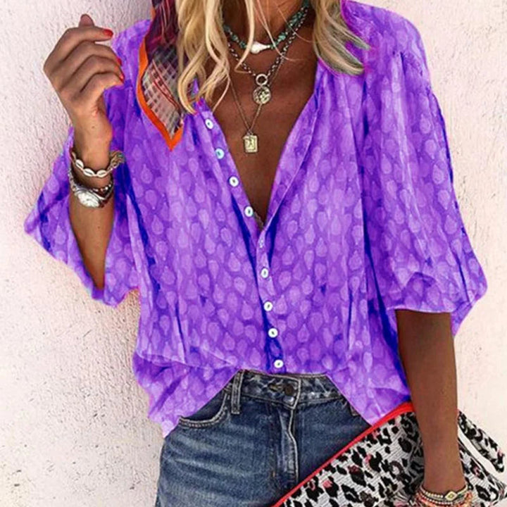 Women's stylish airy summer blouse, elegant and comfortable. Versatile short sleeve top for spring and casual wear.