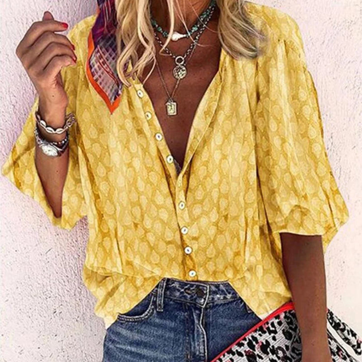 Lightweight & airy women's elegant summer blouse. Comfortable short sleeve top, perfect for everyday style and spring outfits.