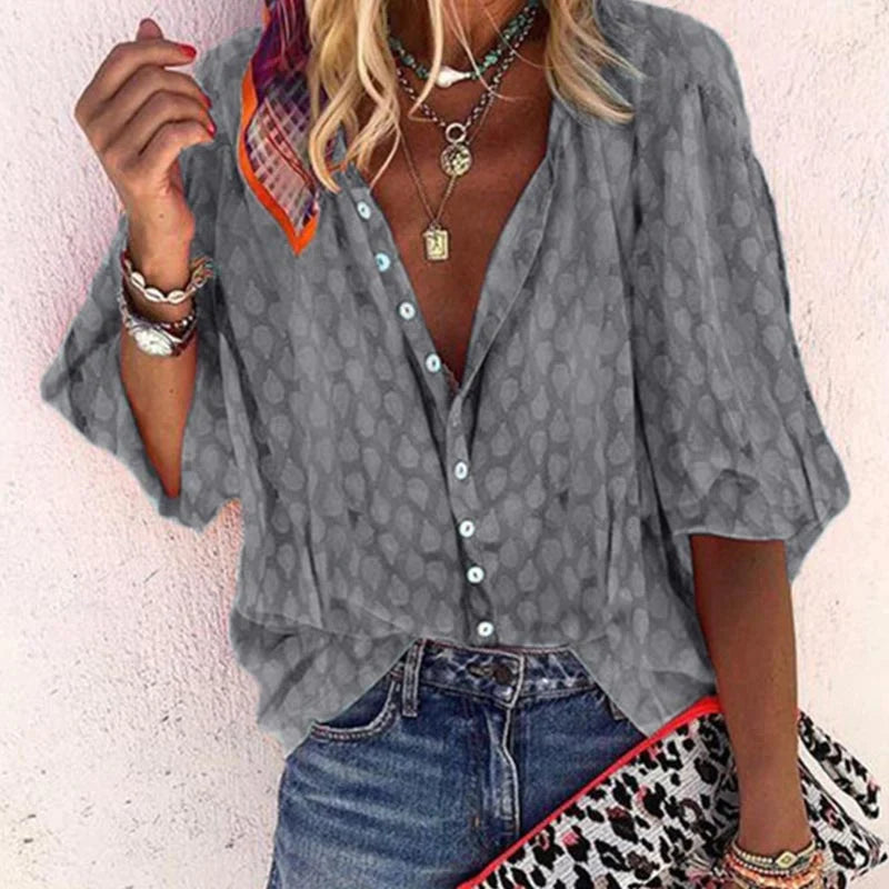 Women's comfortable summer blouse, airy and elegant. Short sleeve top with relaxed fit for spring outfits and everyday style.
