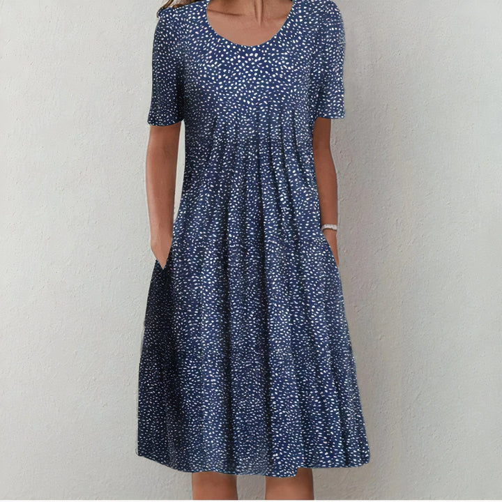 Stylish women's floral print midi dress, perfect lightweight cotton for spring & summer comfort.