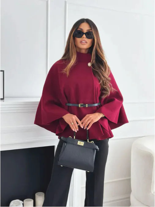 Luxurious tailored long winter coat for women. Elegant, warm outerwear for ladies seeking chic cold weather style.
