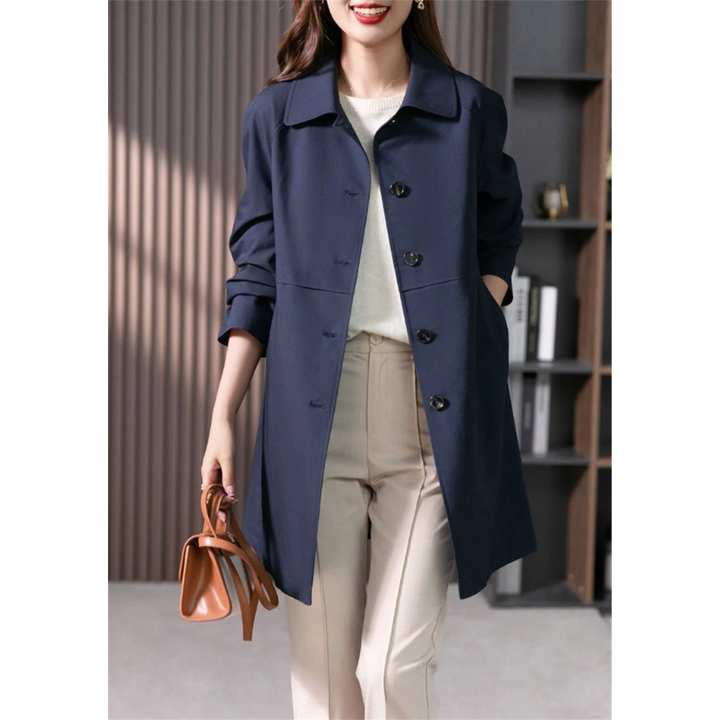 Elegant women's tailored mid-thigh trench coat. Classic style for spring/autumn, perfect for business chic outerwear.