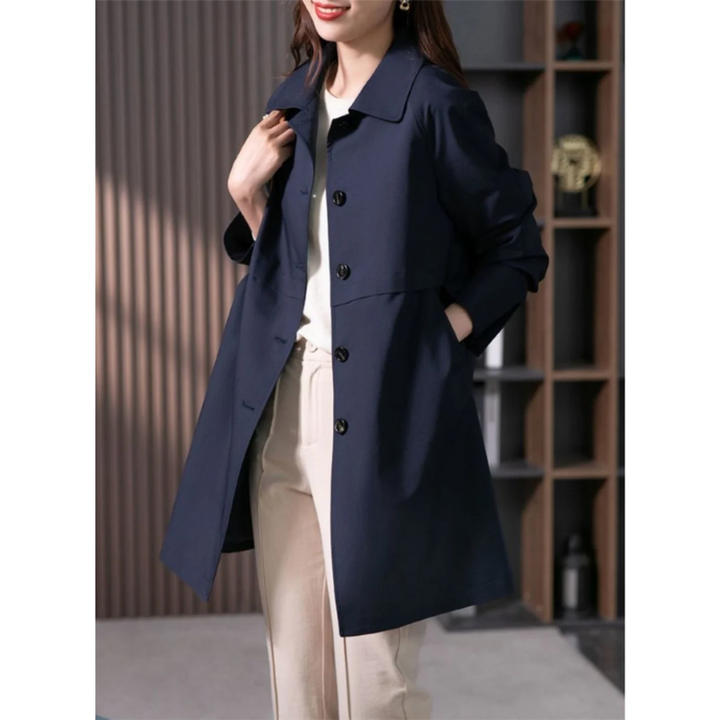 Stylish women's tailored polyester trench coat. Mid-thigh length, versatile for casual or business fashion.