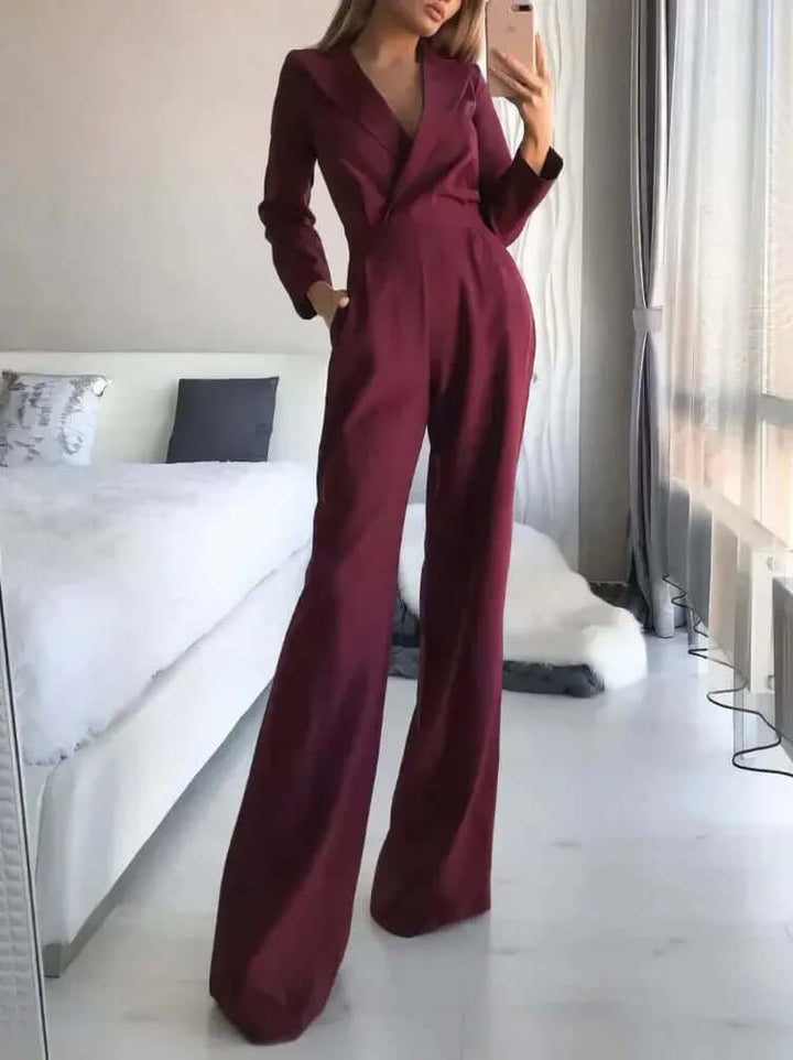 Chic women's wide leg jumpsuit with a tailored fit, offering effortless style for summer or formal wear. Rayon blend.