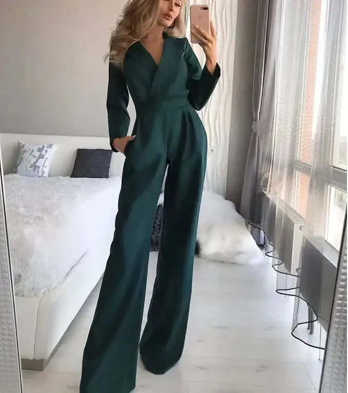 Fashionable women's wide leg jumpsuit, tailored for an elegant look. Versatile rayon blend for formal wear & casual chic.