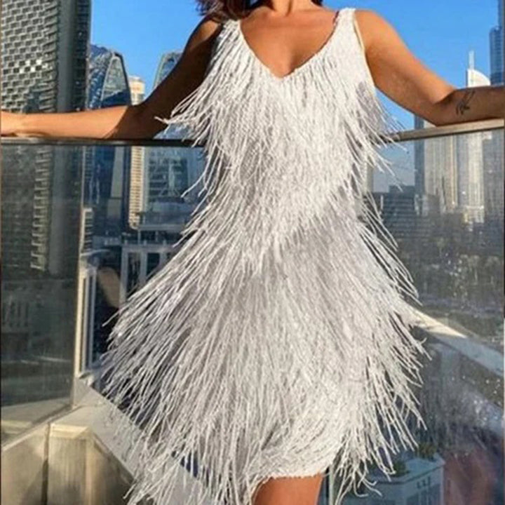 Celeste women's elegant tassel mini dress. Chic party and event wear.