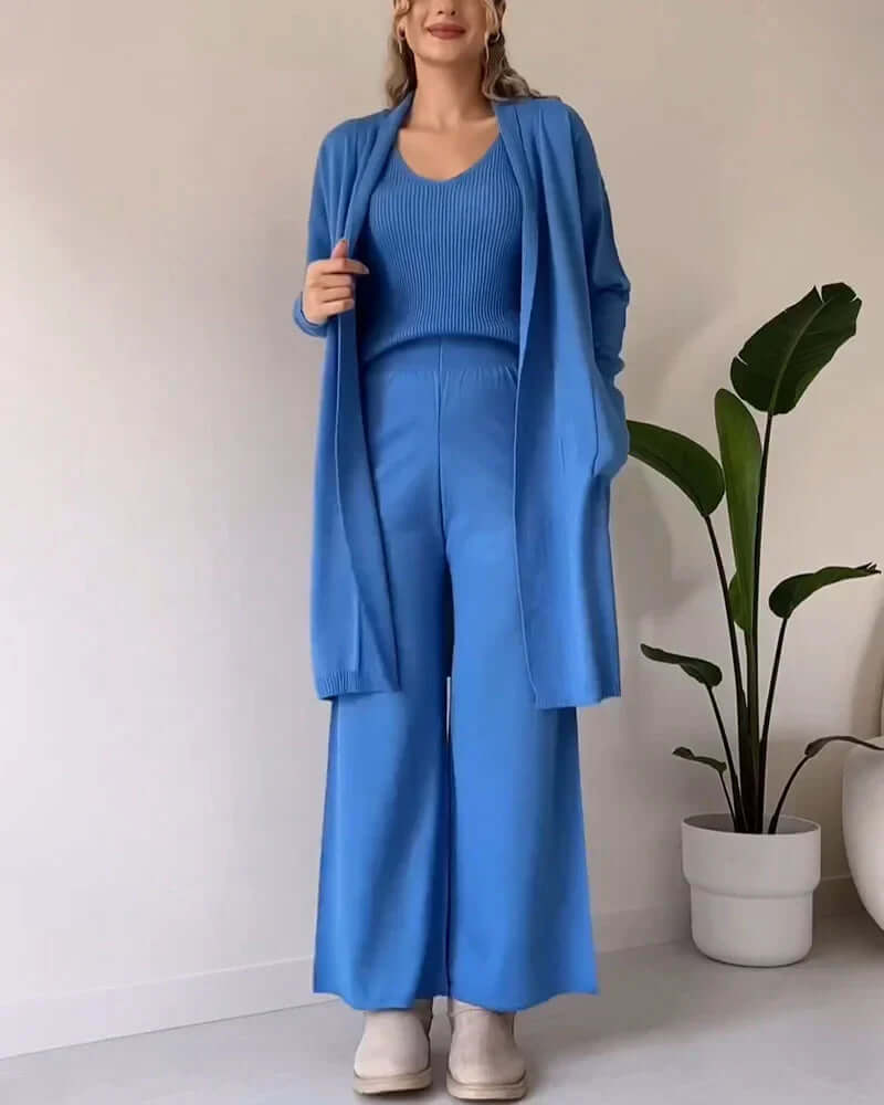 Elegant women's three-piece dress set for special occasions, featuring a midi dress, matching jacket, & sophisticated style.
