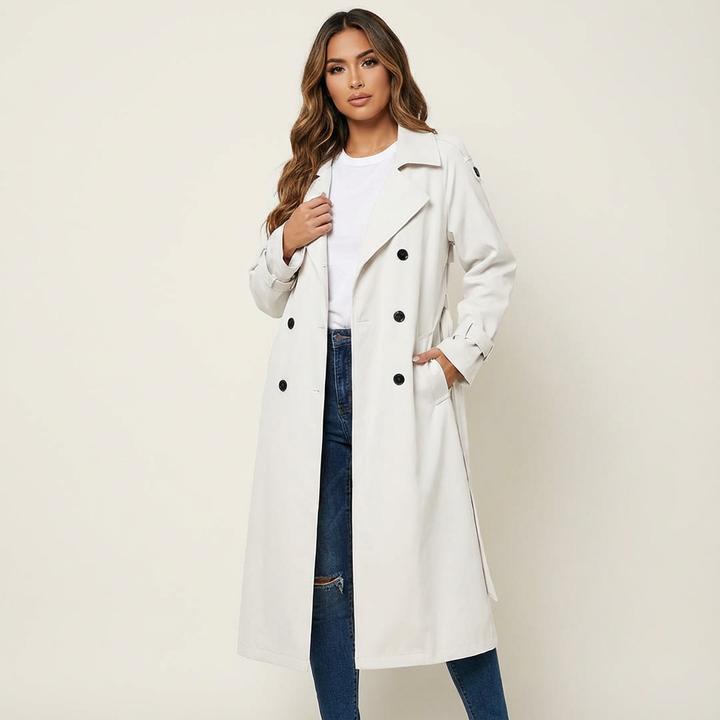 Classic women's long trench coat, a stylish and versatile seasonal jacket. Perfect elegant outerwear for any occasion.