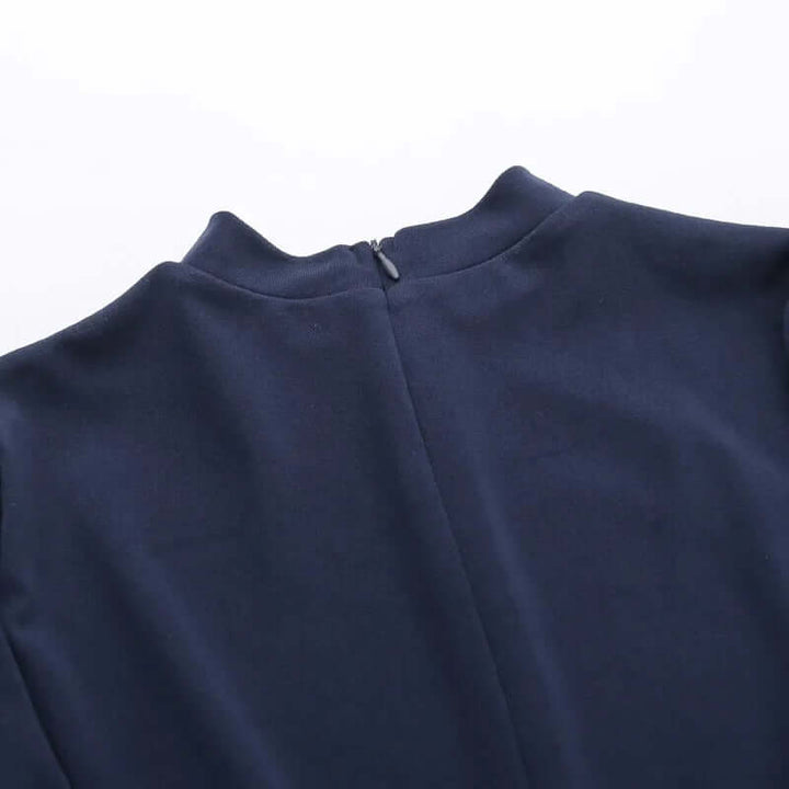 Cozy women's knit turtleneck dress, an elegant and comfortable winter wardrobe essential.