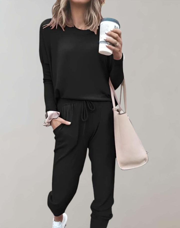 Elegant women's tweed two-piece suit set with tailored jacket & skirt for chic business casual wear.