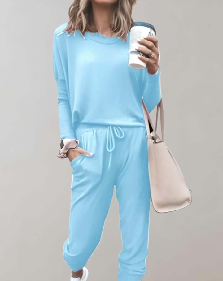 Beautiful women's tweed two-piece suit set. Elegant tailored skirt & jacket, perfect for chic attire.