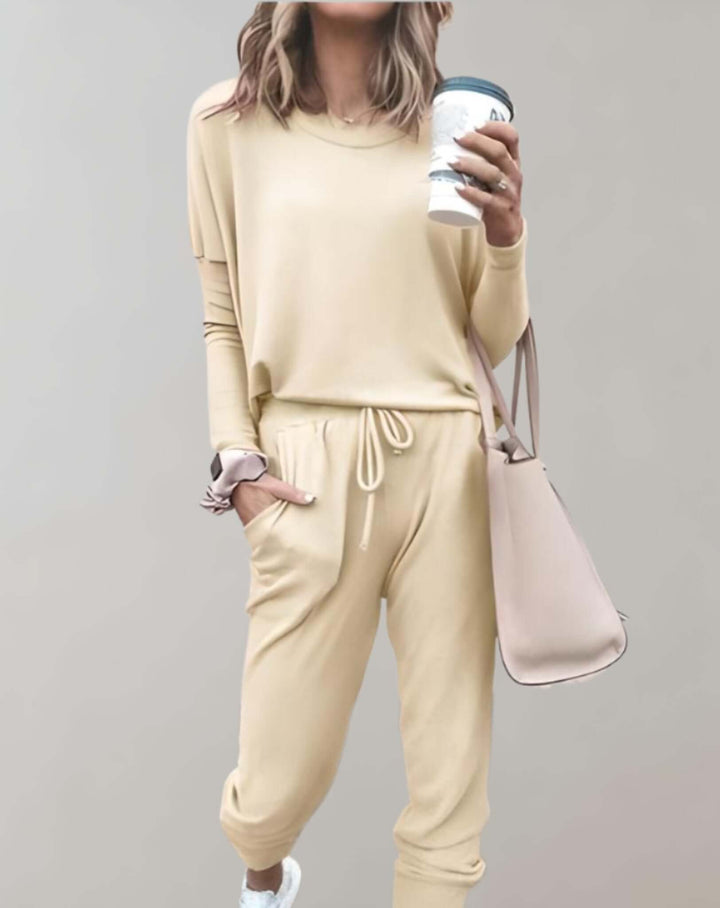 Sophisticated women's tweed skirt suit set. Elegant two-piece tailored outfit for autumn fashion.