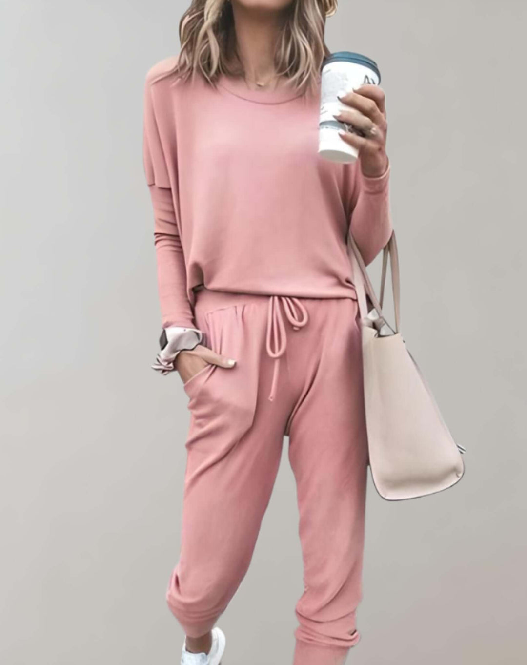 Stylish women's tweed two-piece set. Elegant business casual outfit with tailored skirt & jacket.