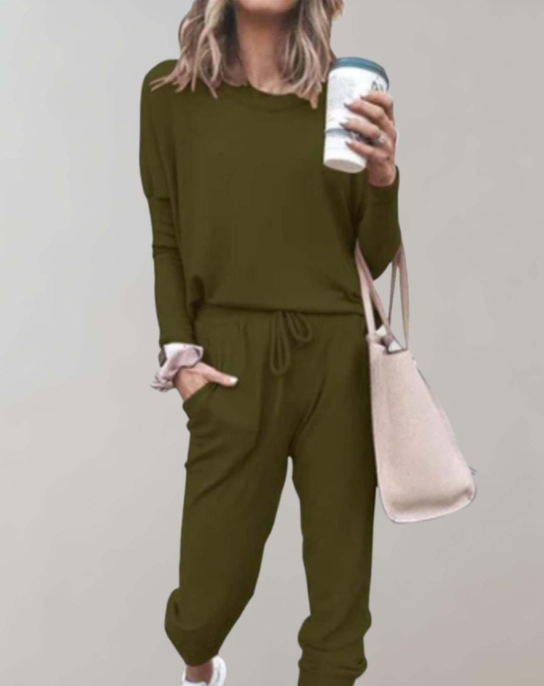 Autumn fashion women's tweed two-piece suit set. Elegant tailored skirt and jacket for sophisticated wear.