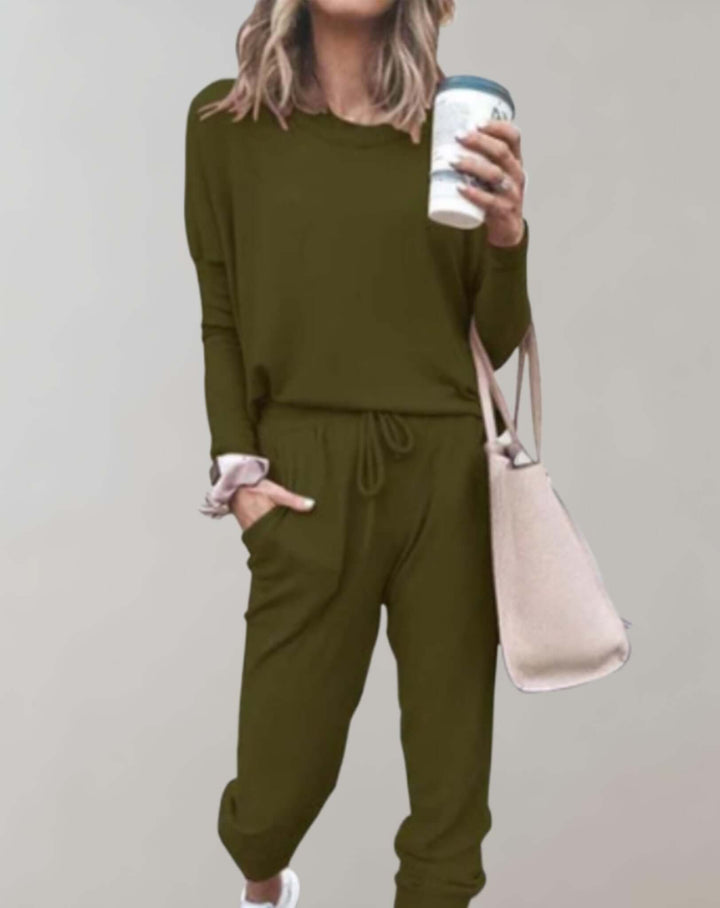 Autumn fashion women's tweed two-piece suit set. Elegant tailored skirt and jacket for sophisticated wear.