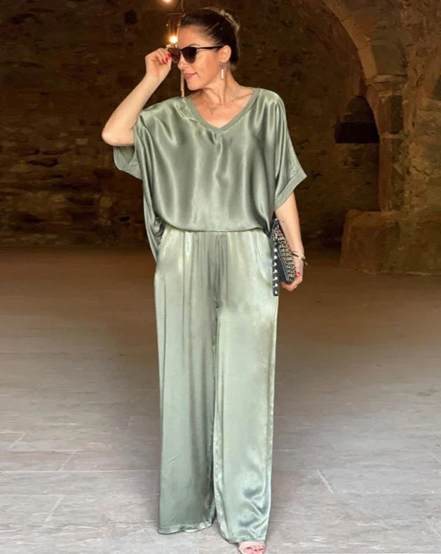 Elegant women's two-piece black pants set with tailored fit, perfect for professional wear & business casual.