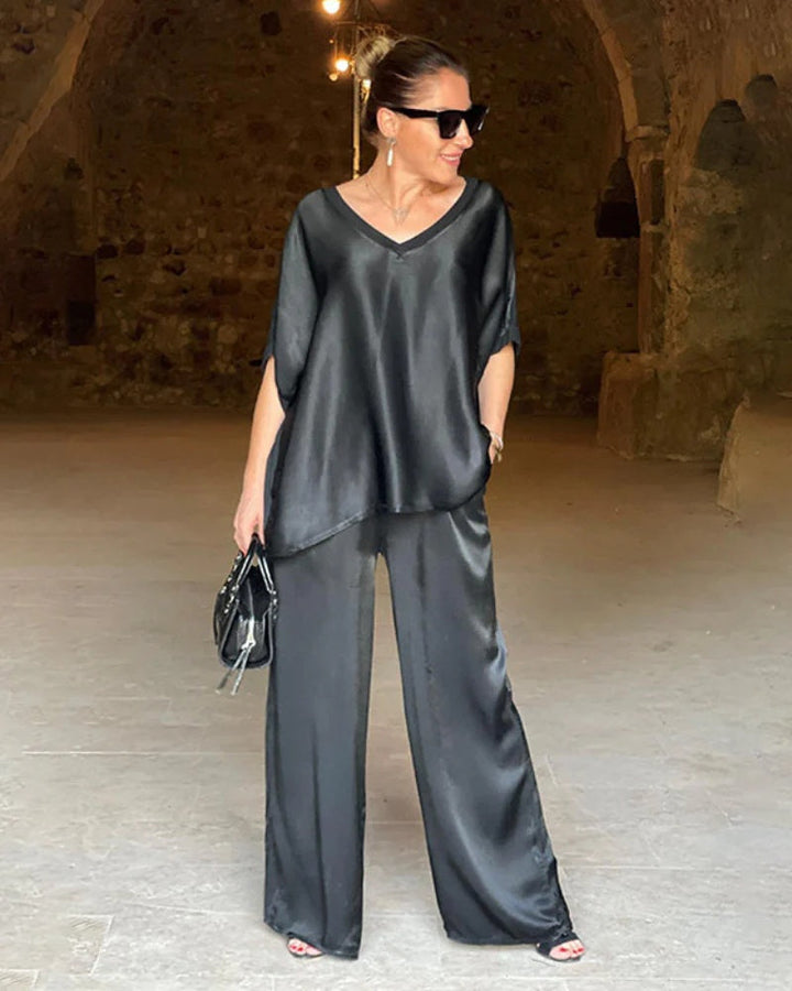 Stylish women's khaki two-piece outfit: coordinated top & pants for elegant business casual or daily wear.