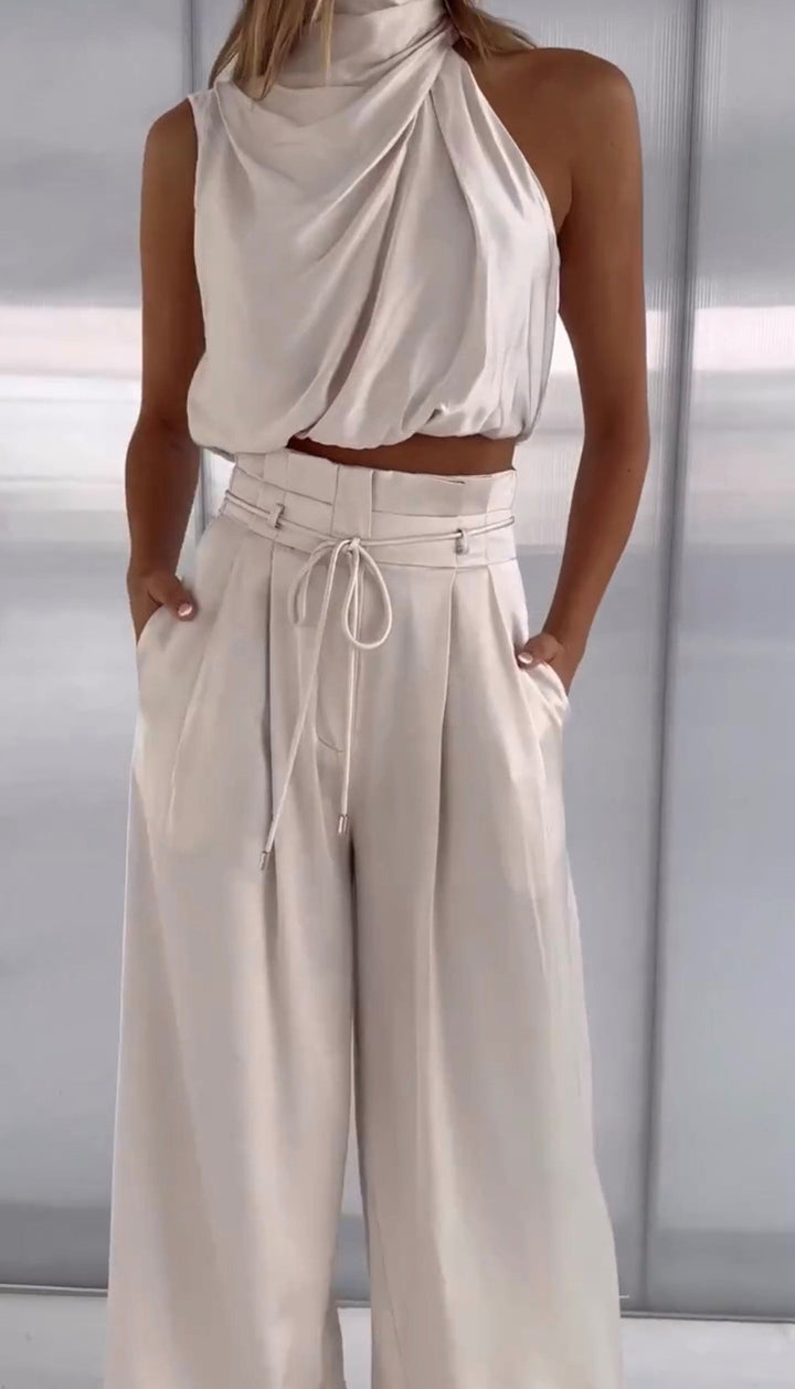 Elegant women's two-piece linen blend outfit, perfect for summer. Chic matching set.