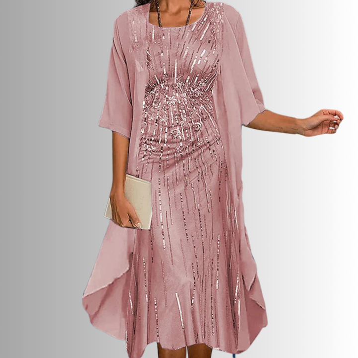 Flowy women's elegant two-piece outfit with a light fabric and subtle floral print, great for warm weather fashion.