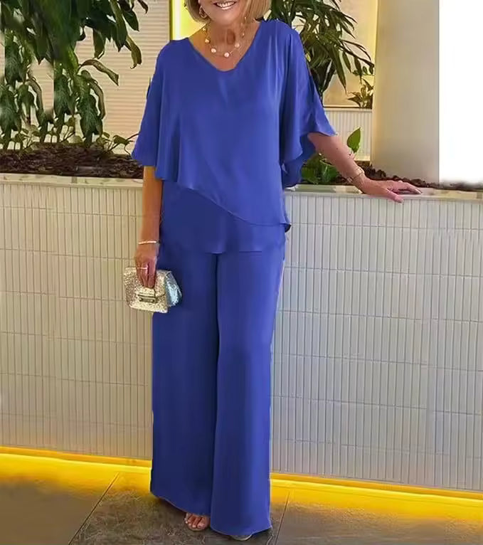 Elegant women's two-piece pants set, featuring a stylish top and comfortable matching trousers, perfect for casual chic.