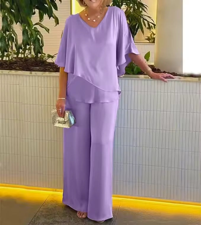 Comfortable women's two-piece outfit: stylish top & versatile pants set. Ideal for elegant, casual chic wear.