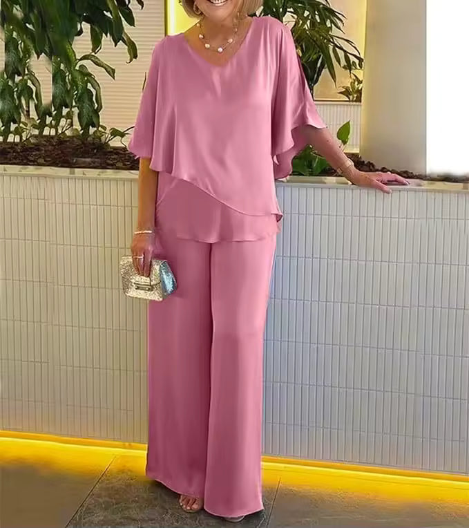 Stylish women's matching two-piece set with an elegant top and comfortable pants for a versatile, chic look.