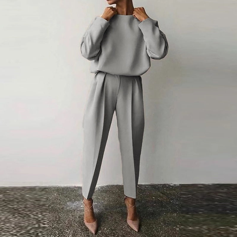 Chic women's two-piece fashion suit, a stylish and elegant matching set for a sophisticated and comfortable outfit.