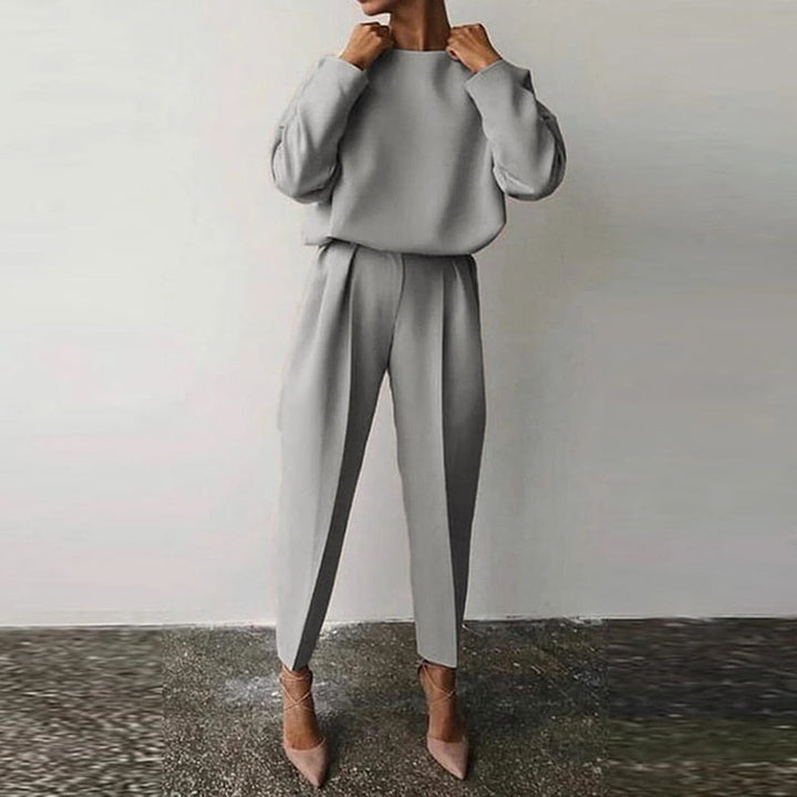Chic women's two-piece fashion suit, a stylish and elegant matching set for a sophisticated and comfortable outfit.