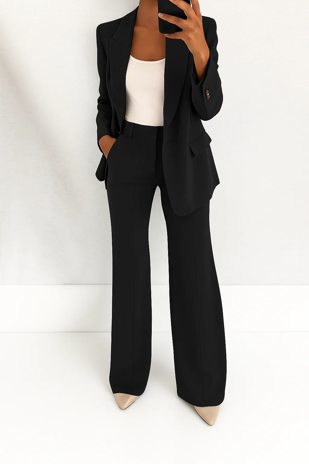 Contemporary women's two-piece suit. Stylish professional business attire, elegant & versatile for office & formal.