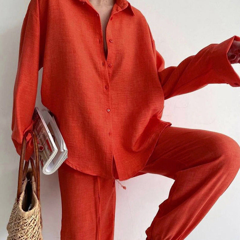 Effortless women's summer outfit: fashionable blouse and comfortable wide-leg pants set. Casual elegant.