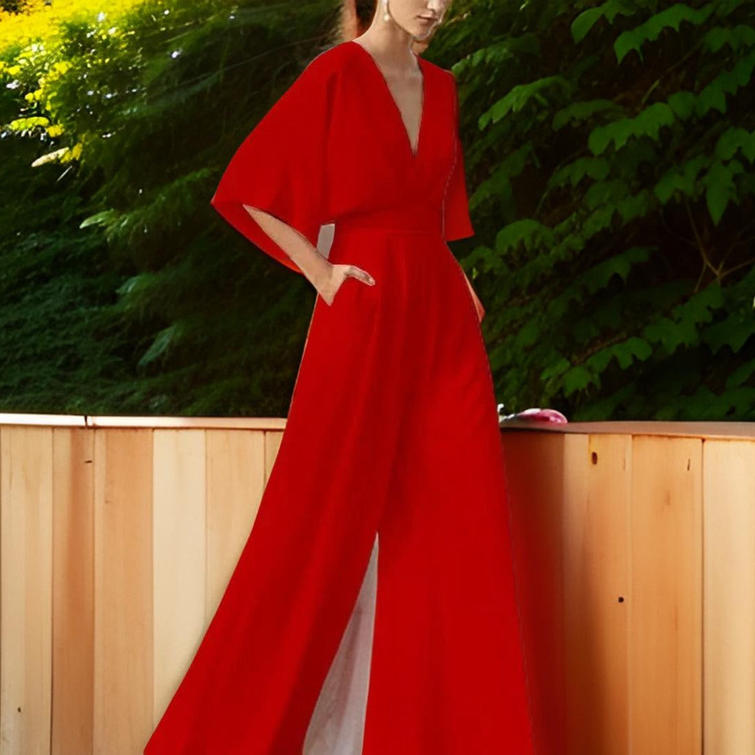 Chic women's V-neck jumpsuit with three-quarter sleeves, ideal for elegant summer events & versatile fashion looks.