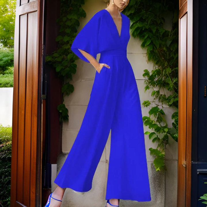 Versatile women's V-neck jumpsuit with 3/4 sleeves, suitable for casual outings or elegant party wear. Summer fashion.