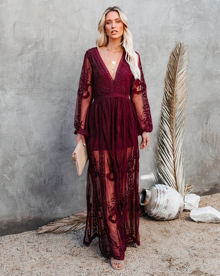 Chic V-neck maxi dress for women featuring a stylish slit. A versatile elegant dress for evening wear, parties & formal events.
