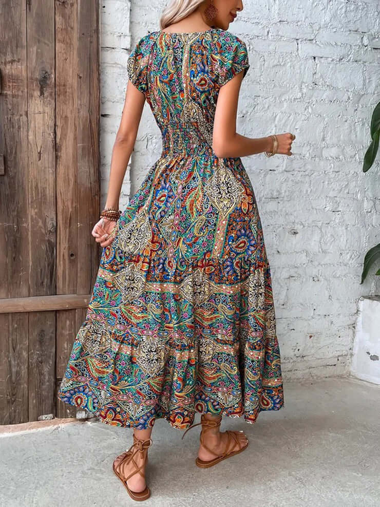 Flowy polyester blend V-neck midi dress for women, lightweight and casual. Great summer beach or vacation wear.