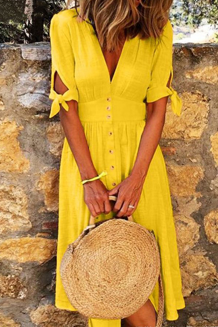 Elegant women's V-neck midi dress with short sleeves & button-down front. Perfect for summer casual wear.