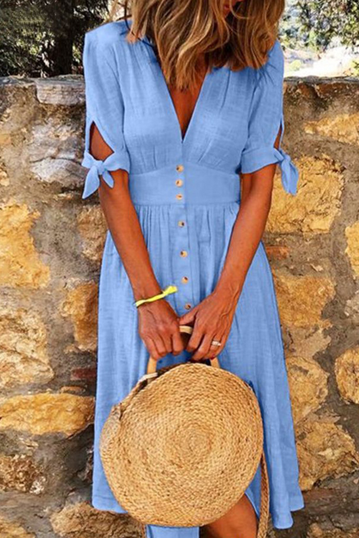 Women's V-neck short sleeve midi dress with functional buttons & chic tie-cuff. Comfortable loose fit summer dress.
