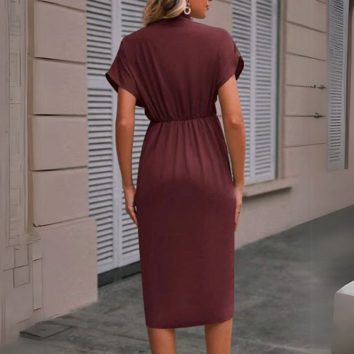 Effortless women's V-neck midi work dress, offering a flattering fit for sophisticated professional and business style.